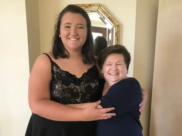 The writer and her grandmother pose for a photo together.